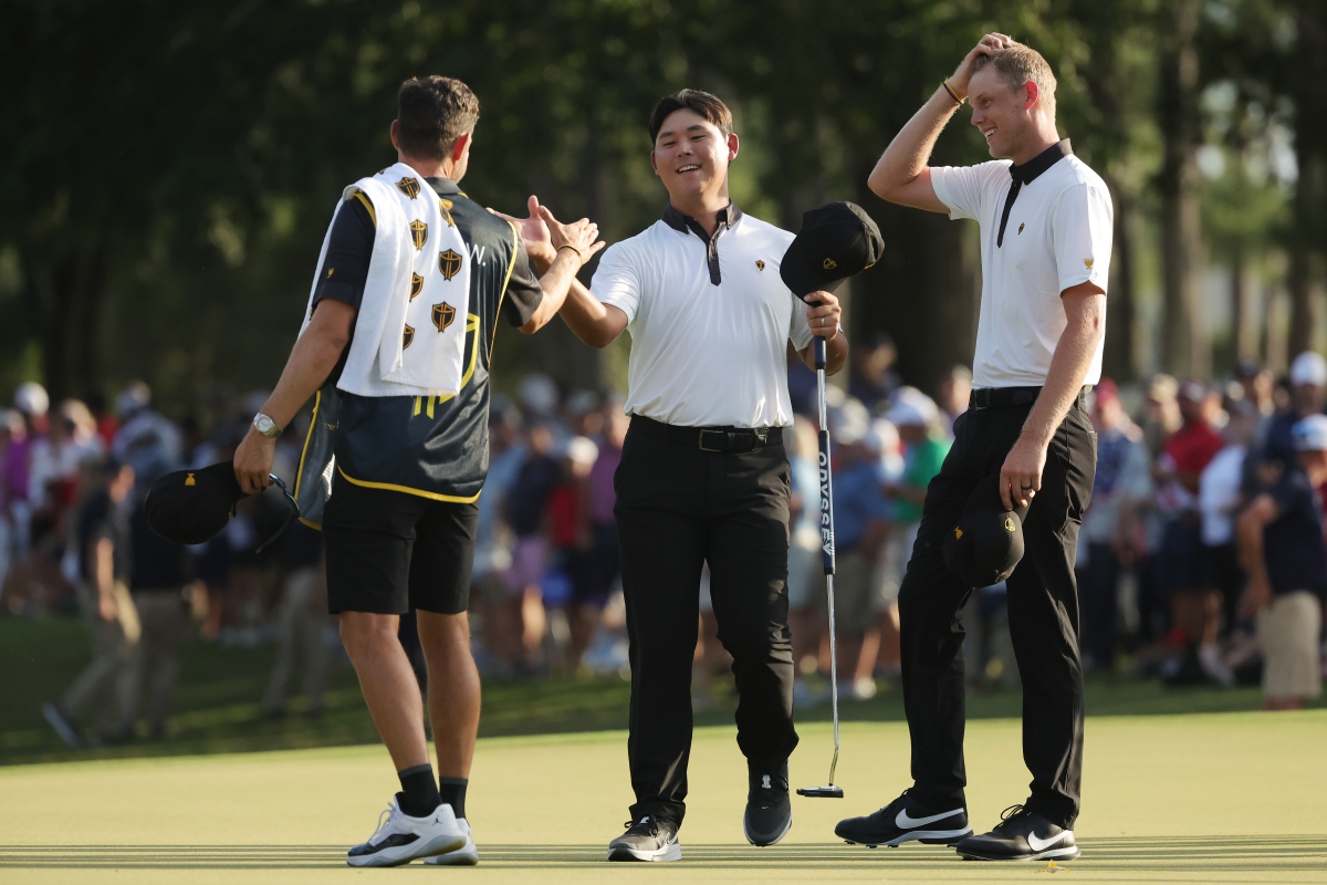 Kim Siwoo dan Cam Davis, Day 1 Presidents Cup 2022.